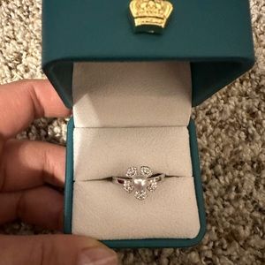 Adjustable moisannite pearl flower ring.